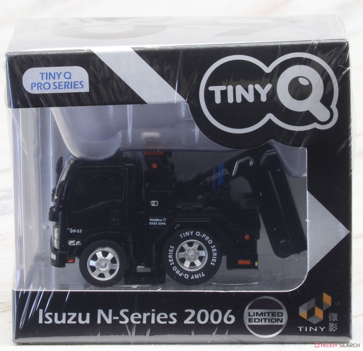 TinyQ いすゞ Nシリーズ 2006 レッカー車 TinyQ logo (玩具) パッケージ1